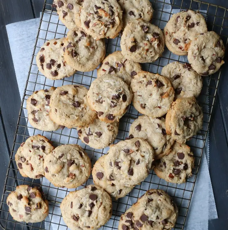 overhead view of baked treasure cookies piled on a cooling rack