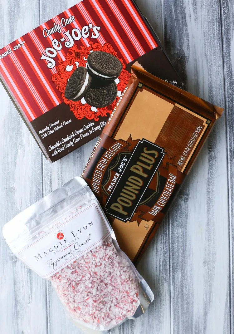 Trader Joe's Candy Cane Joe Joe's sandwich cookies with Trader Joe's Pound Plus Dark Chocolate and Maggie Lyon Peppermint Crunch.