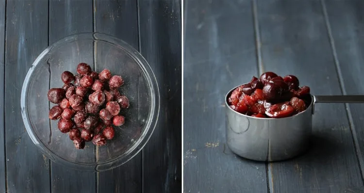 Frozen cherries in a glass bowl and measuring cup.